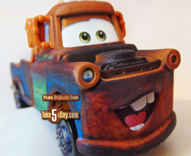 Tow Mater, The character Tow Mater from Cars hangs out of t…, tow mater